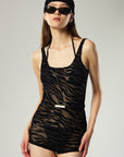 PLAYSUIT IN BLACK ZEBRA MESH