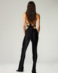 LOW-RIDER SKINNY FLARE BUCKLE PANTS IN BLACK