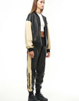 THE SQUAD LEATHER BOMBER IN BLACK AND CREAM