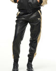 THE VIRALIZER UNISEX LEATHER TRACKSUIT BOTTOMS IN BLACK AND CREAM