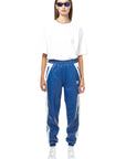 THE VIRALIZER UNISEX LEATHER TRACKSUIT BOTTOMS IN WHITE AND ROYAL BLUE