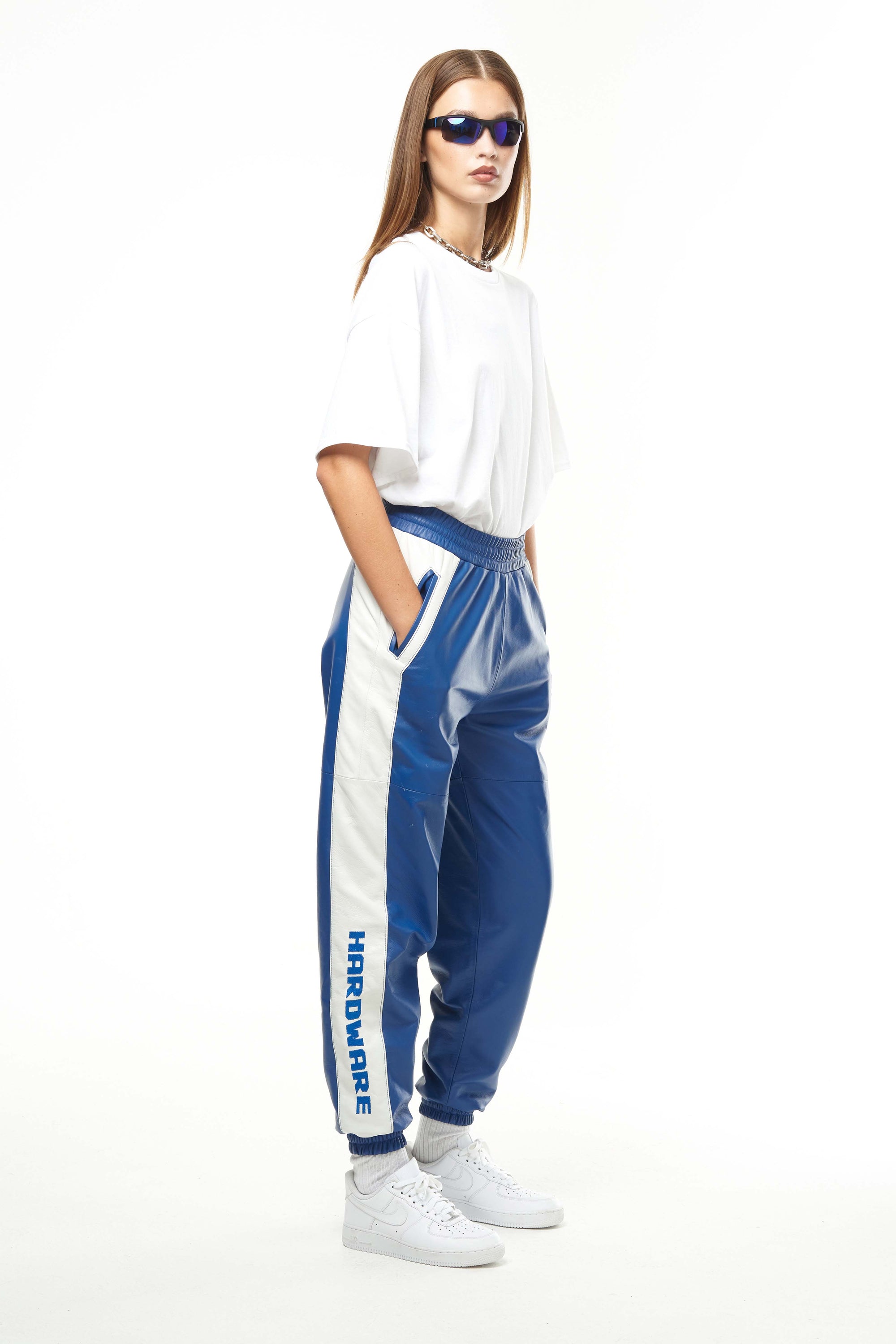 THE VIRALIZER UNISEX LEATHER TRACKSUIT BOTTOMS IN WHITE AND ROYAL BLUE