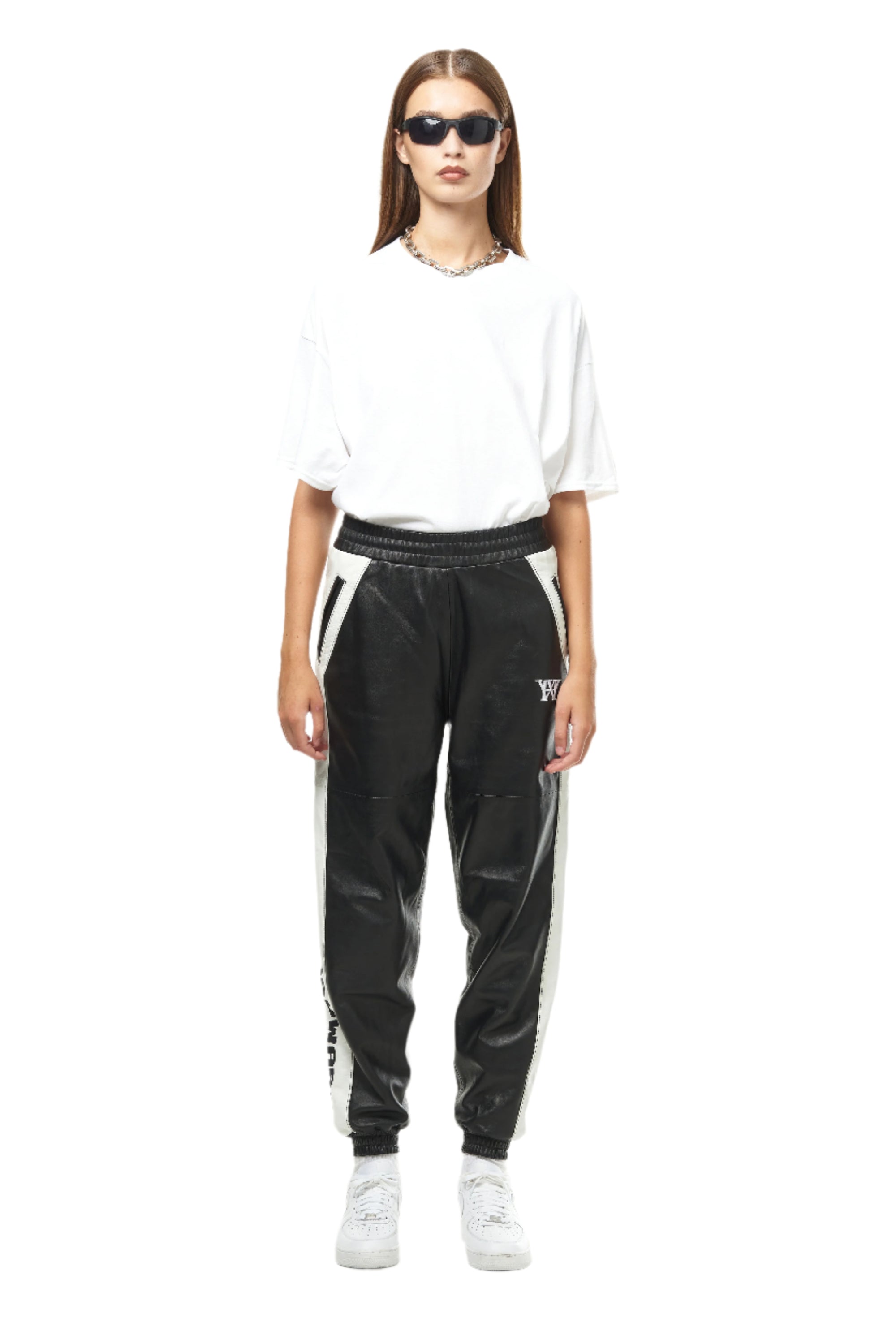 THE VIRALIZER UNISEX LEATHER TRACKSUIT BOTTOMS IN BLACK AND WHITE