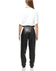 THE VIRALIZER UNISEX LEATHER TRACKSUIT BOTTOMS IN BLACK AND WHITE