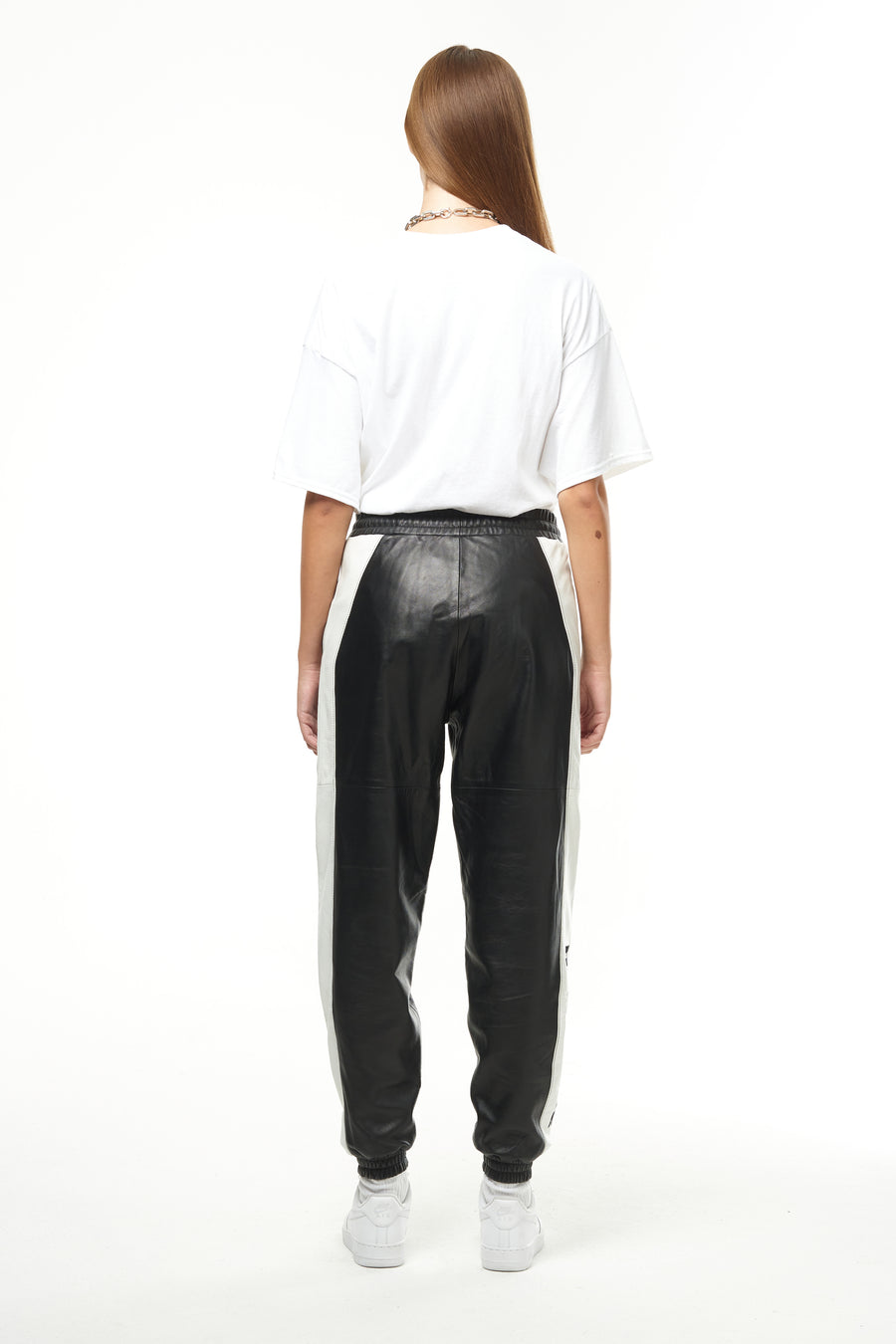 THE VIRALIZER UNISEX LEATHER TRACKSUIT BOTTOMS IN BLACK AND WHITE