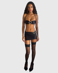 LOWRIDER BUCKLE MINI SKIRT IN BLACK