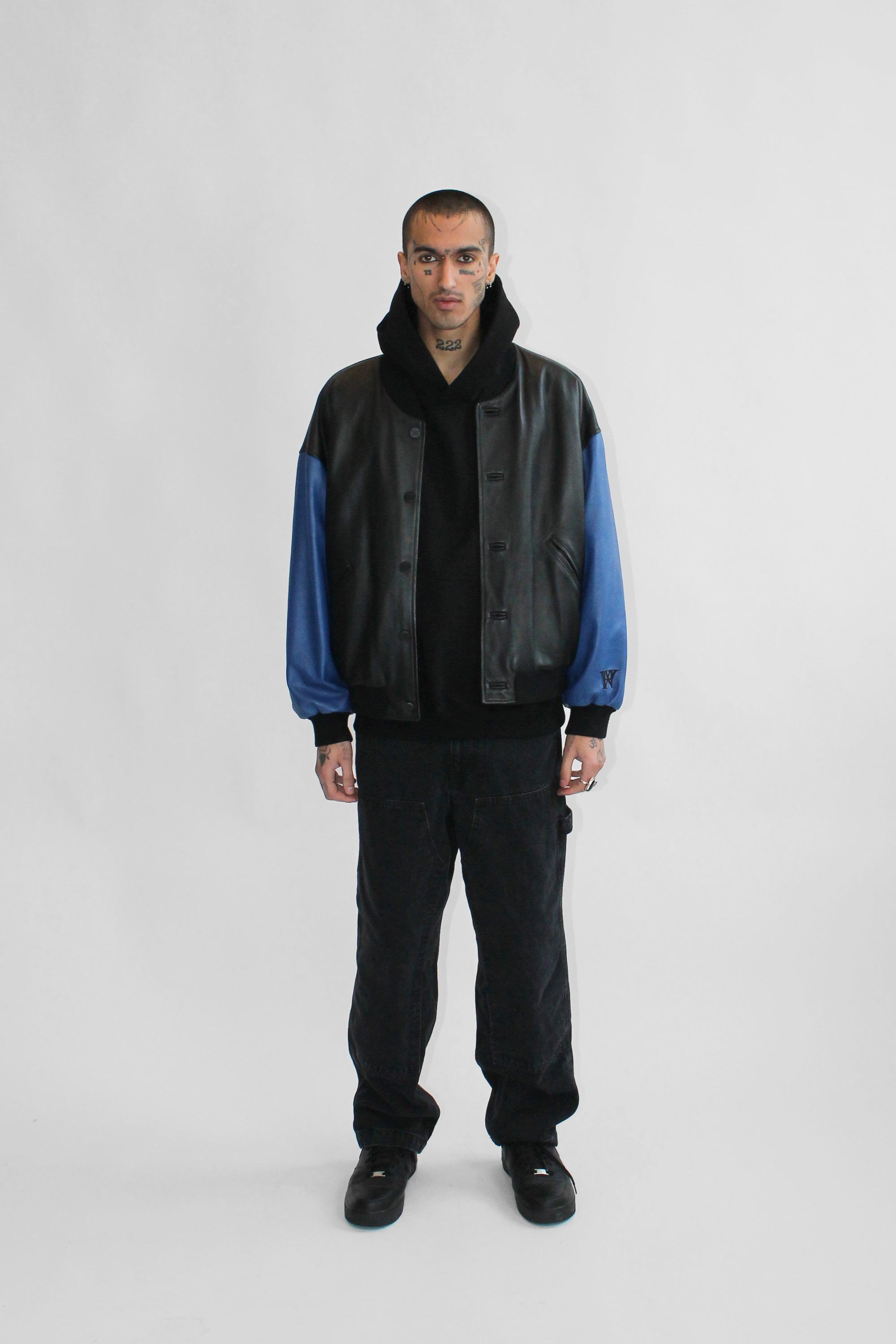 THE SQUAD LEATHER UNISEX BOMBER IN BLACK AND BLUE