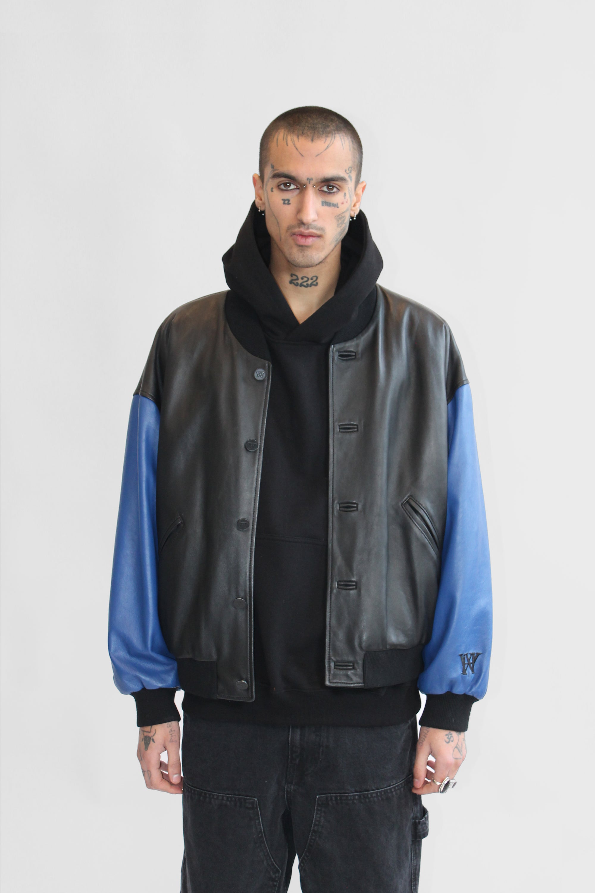 THE SQUAD LEATHER UNISEX BOMBER IN BLACK AND BLUE