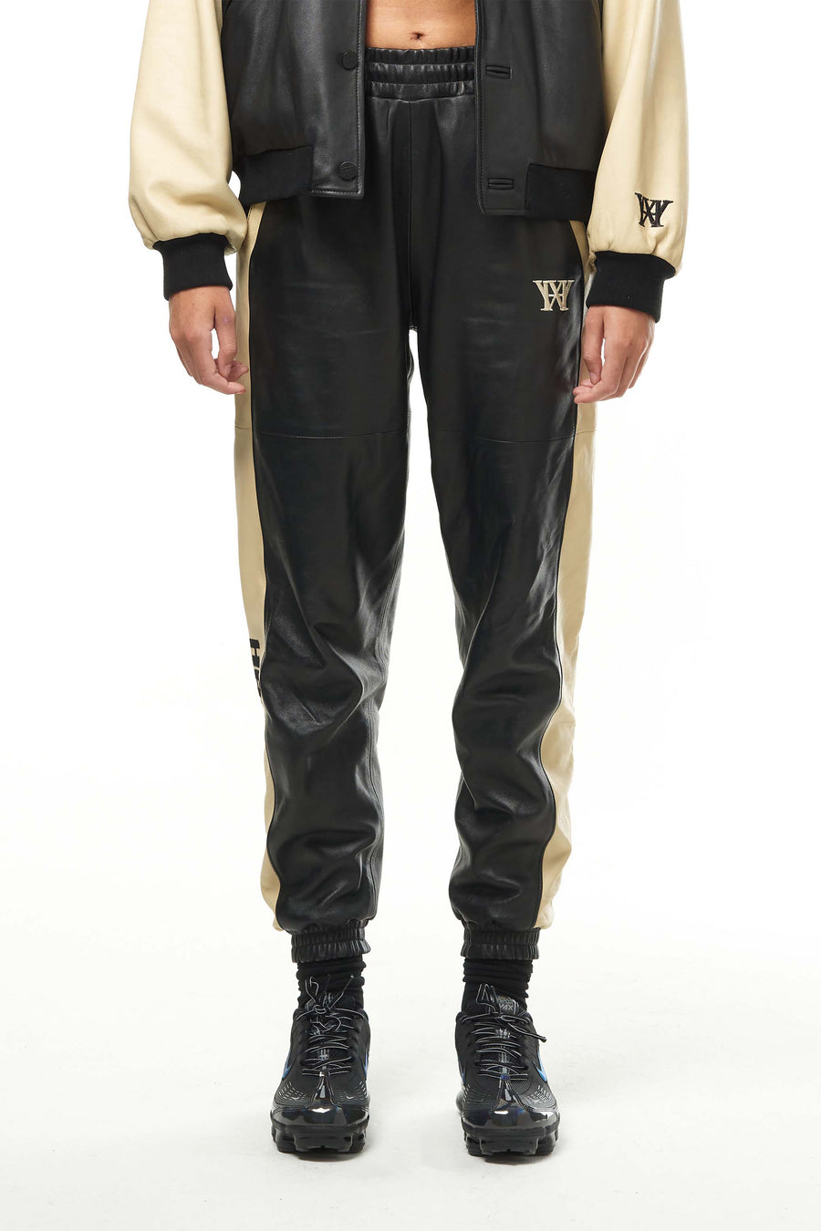THE VIRALIZER UNISEX LEATHER TRACKSUIT BOTTOMS IN BLACK AND CREAM