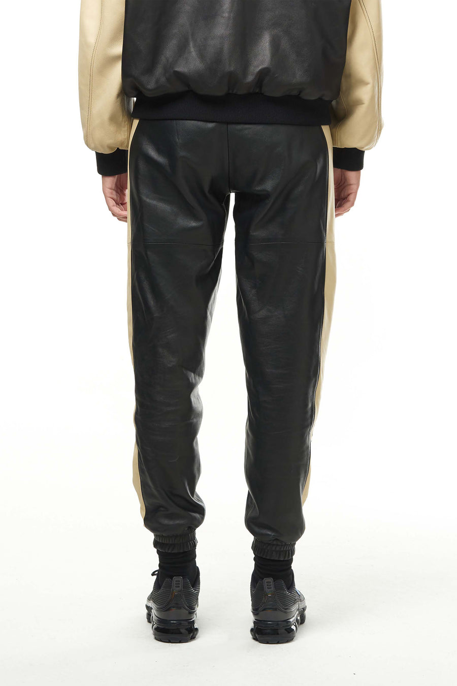 THE VIRALIZER UNISEX LEATHER TRACKSUIT BOTTOMS IN BLACK AND CREAM